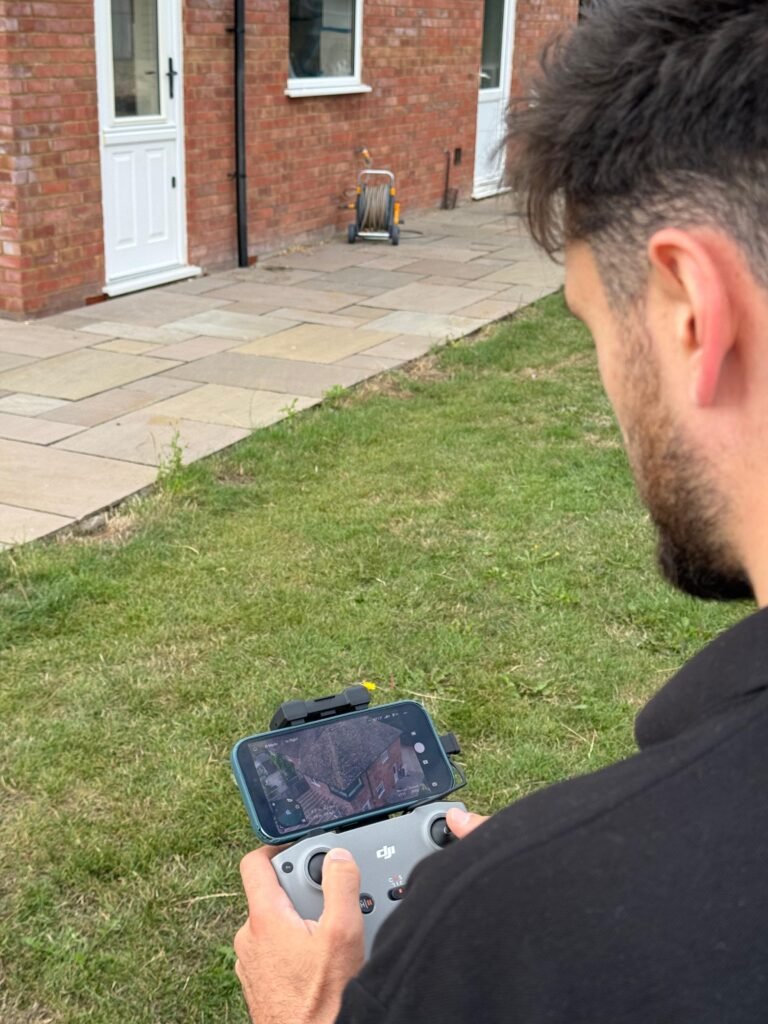 Surveyor inspecting a residential property during a RICS Level 1 condition survey in South East England