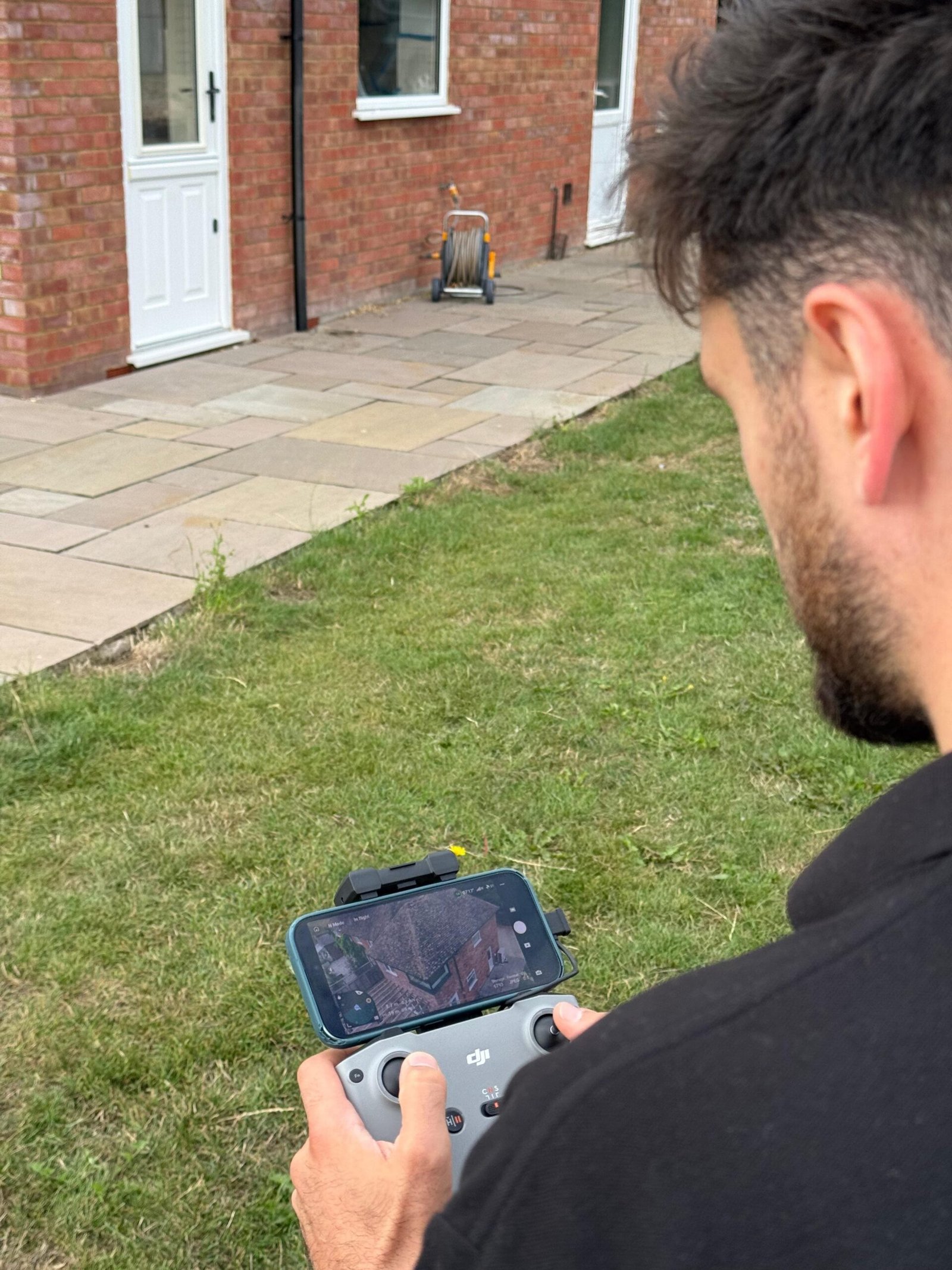 Surveyor inspecting a residential property during a RICS Level 1 condition survey in South East England